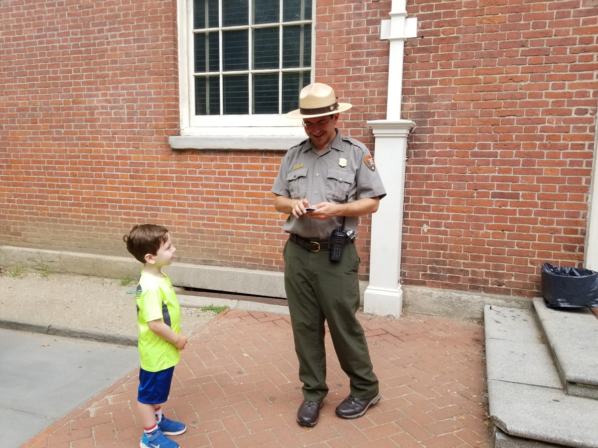 Receiving a Trading Card from a Park Ranger at Congress Hall