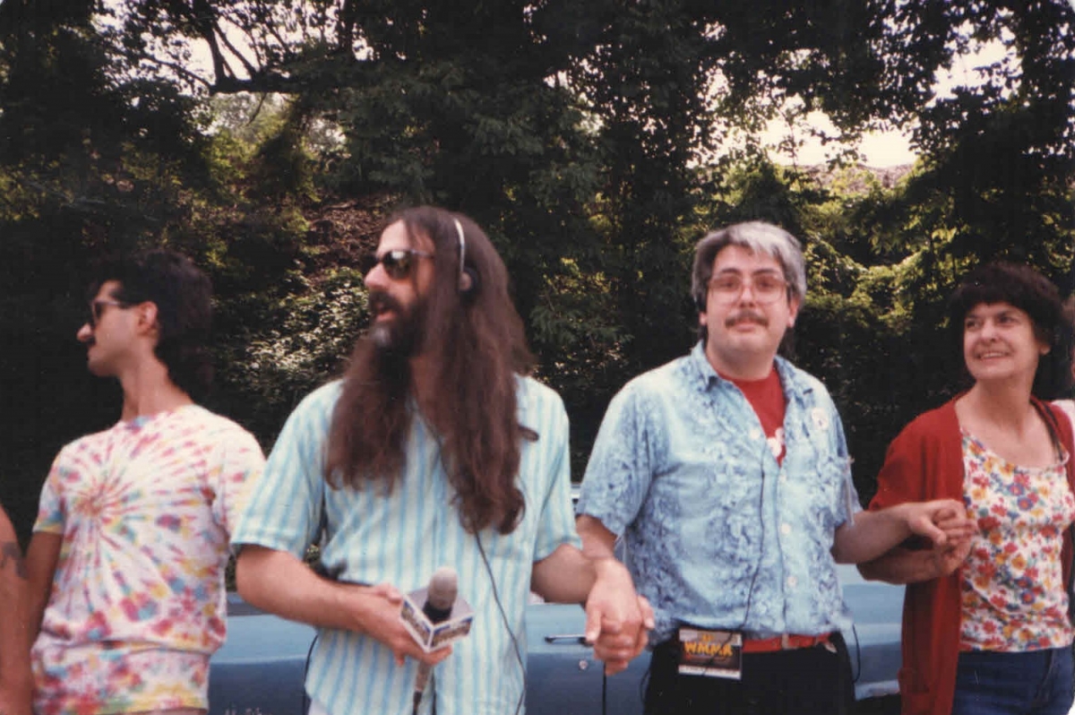 Hands Across America with WMMR-FM, Pierre Robert, May 25, 1986, West River Drive in Philadelphia (Pictured: Pierre Robert (holding microphone and Buzz Barclay to the right of Pierre)