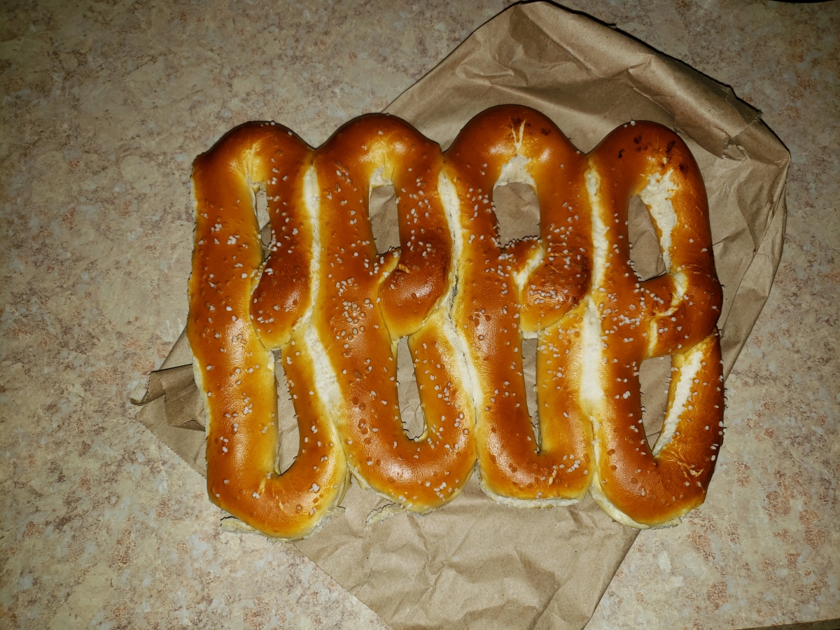 Philadelphia Soft Pretzels often are purchased attached to one another in a brown paper bag