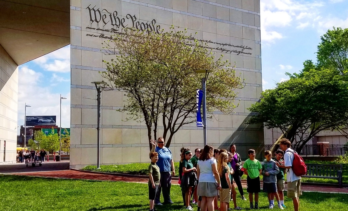 A group about to go on a morning constitutional, while on The Constitutional Walking Tour, in front of the National Constitution Center