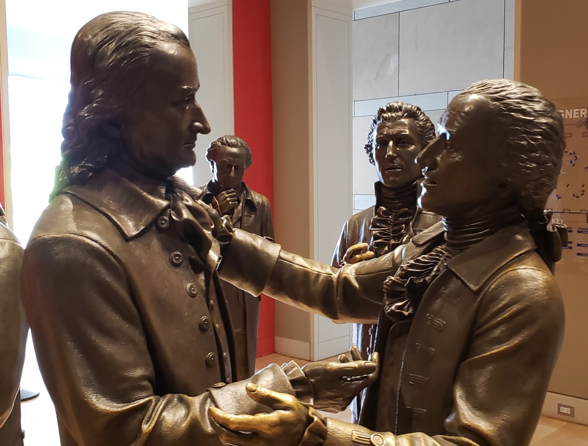 Hugh Williamson Statue (left) in Signers' Hall at the National Constitution Center
